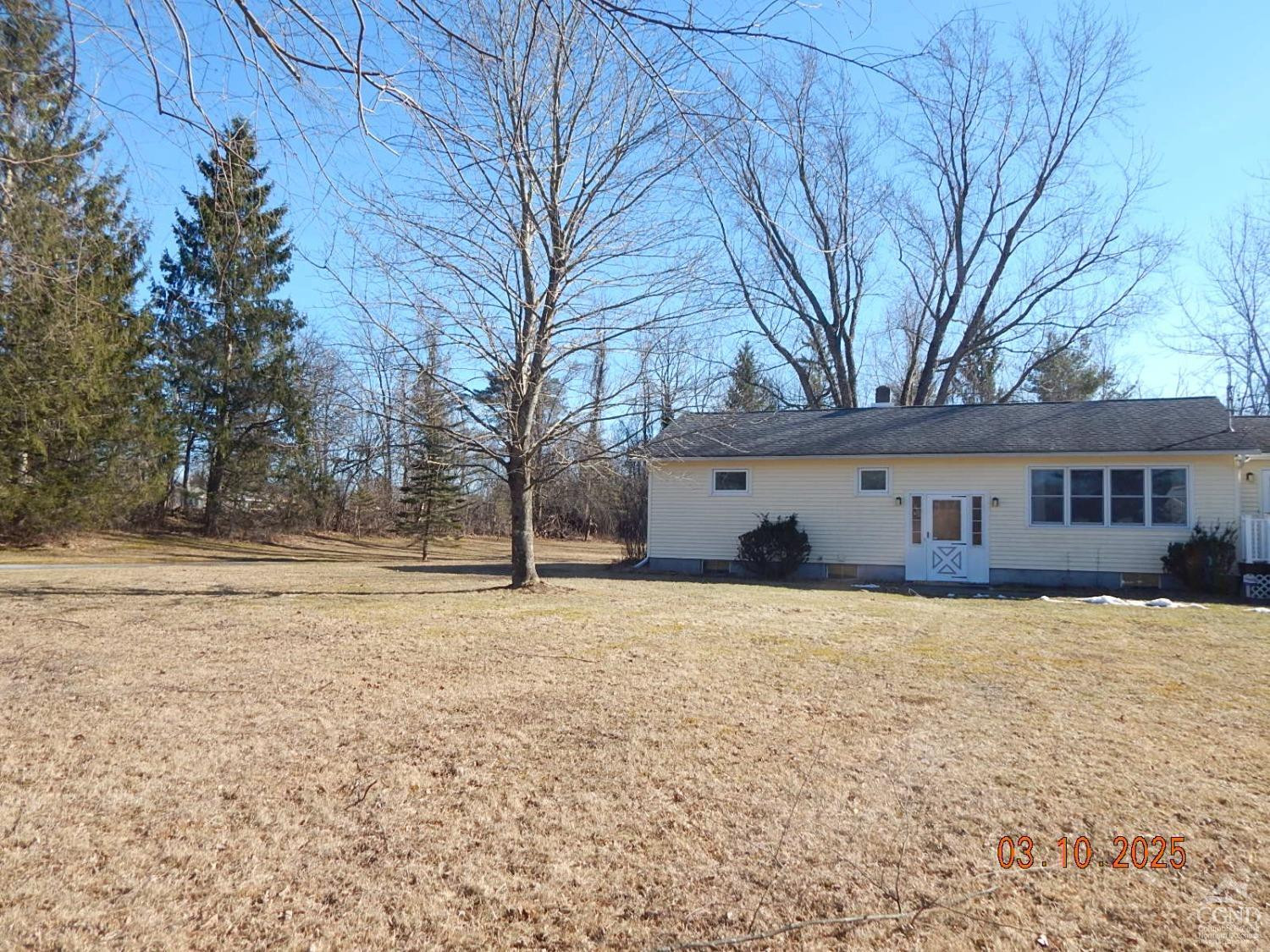 721 Irving Road Greenville, NY 12083 - Photo 6 of 29 a house that has a tree in front of it