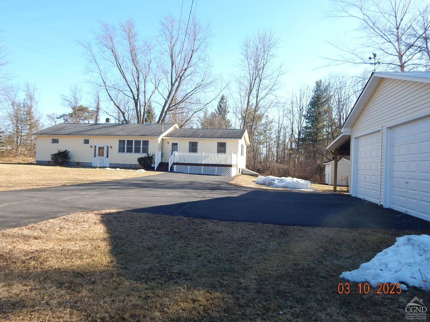 721 Irving Road Greenville, NY 12083 - Photo 7 of 29 a front view of a house with a yard