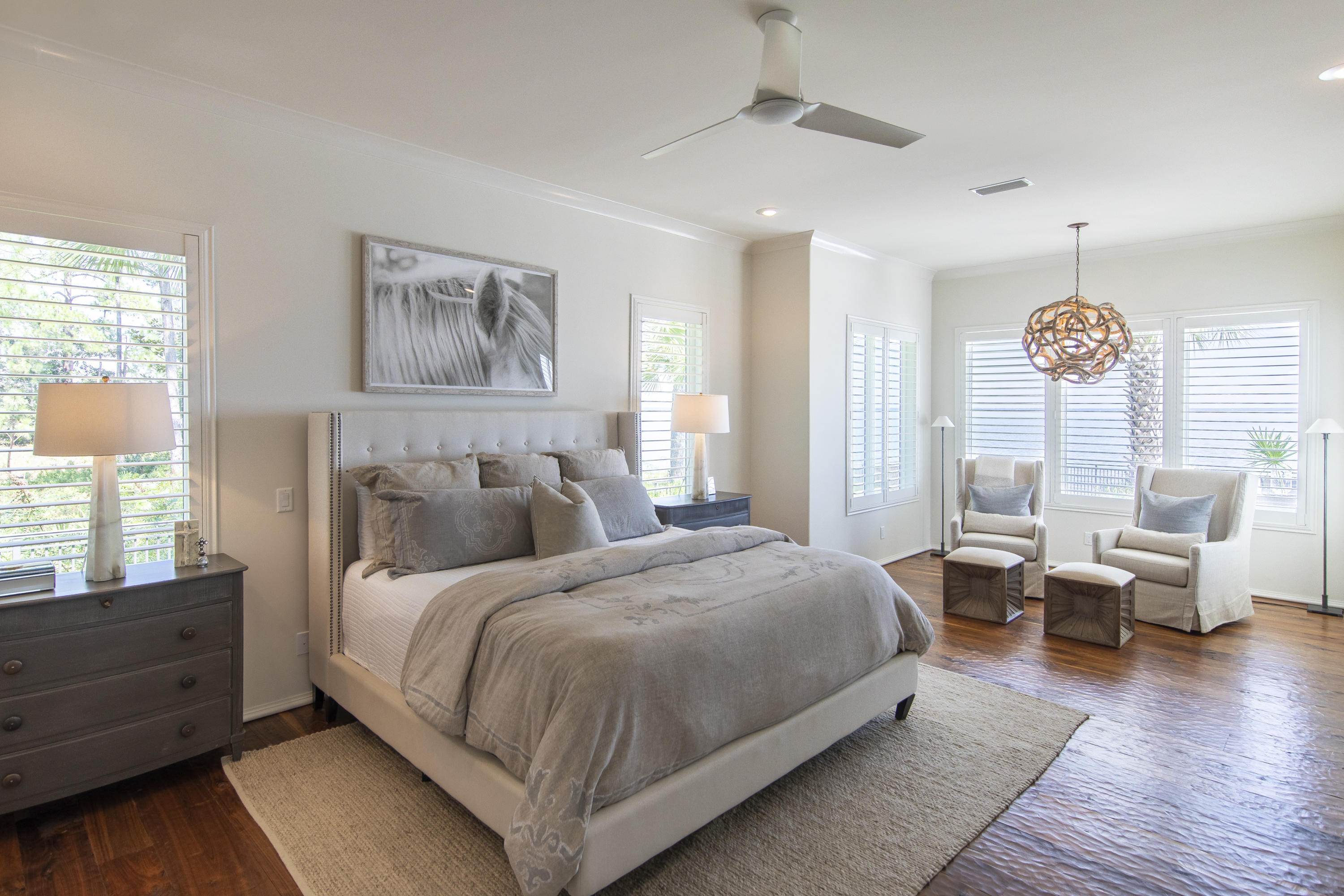 1095 Driftwood Point Road Santa Rosa Beach, FL 32459 - Photo 16 of 44 a bedroom with bed and wooden floor