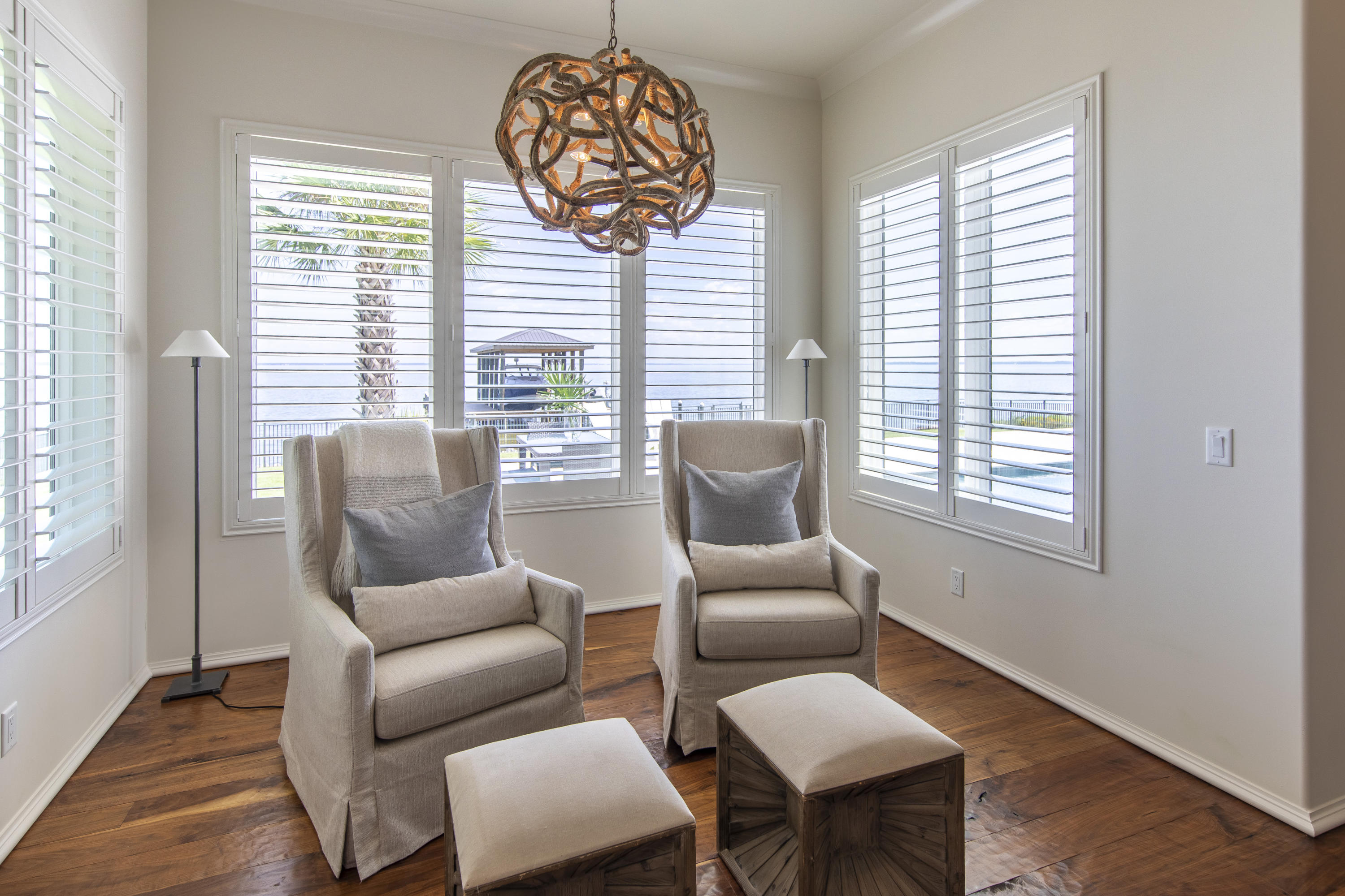 1095 Driftwood Point Road Santa Rosa Beach, FL 32459 - Photo 18 of 44 a living room with furniture and a large window