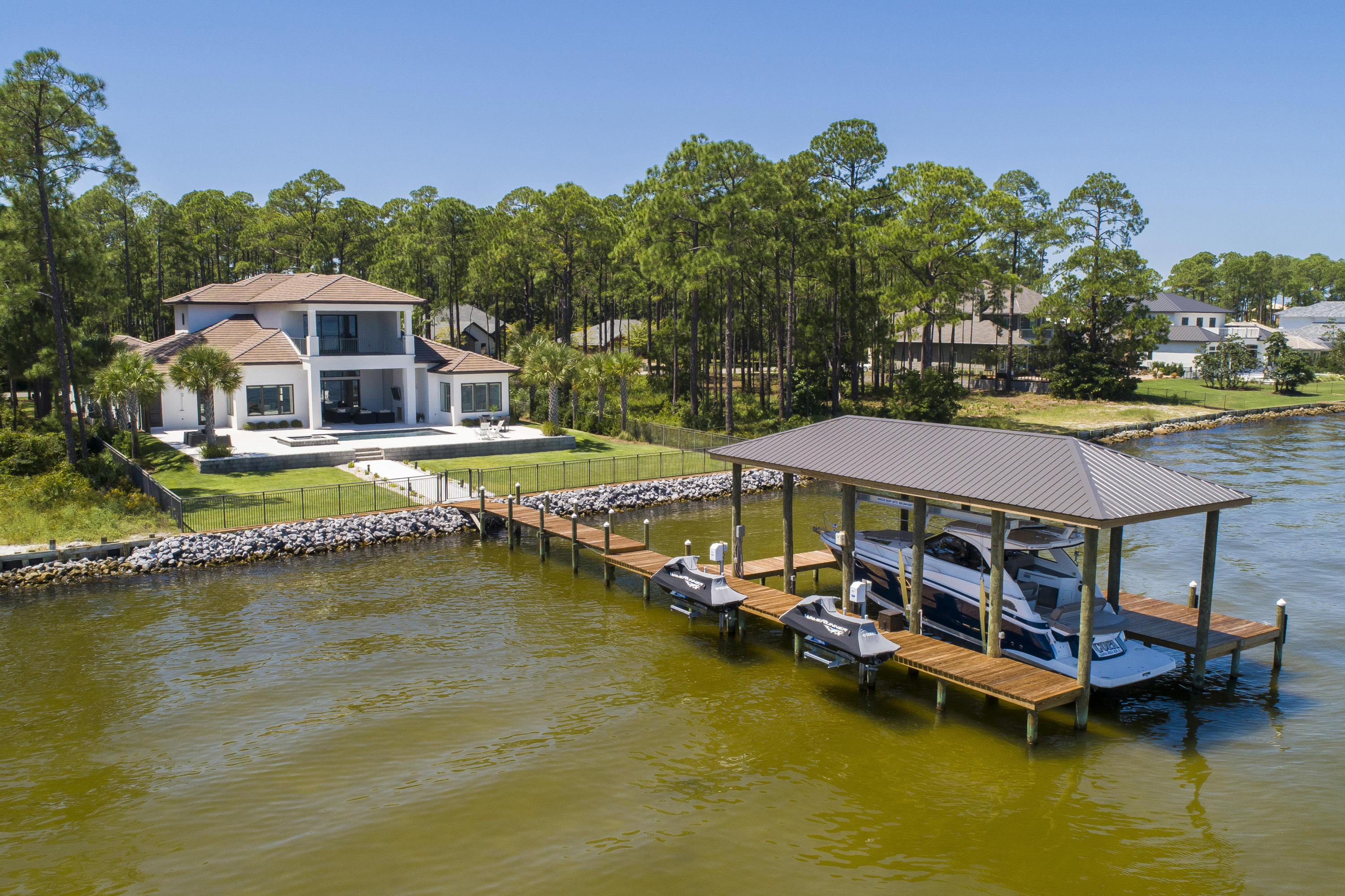 1095 Driftwood Point Road Santa Rosa Beach, FL 32459 - Photo 2 of 44 a view of a lake with a house swimming pool and outdoor space