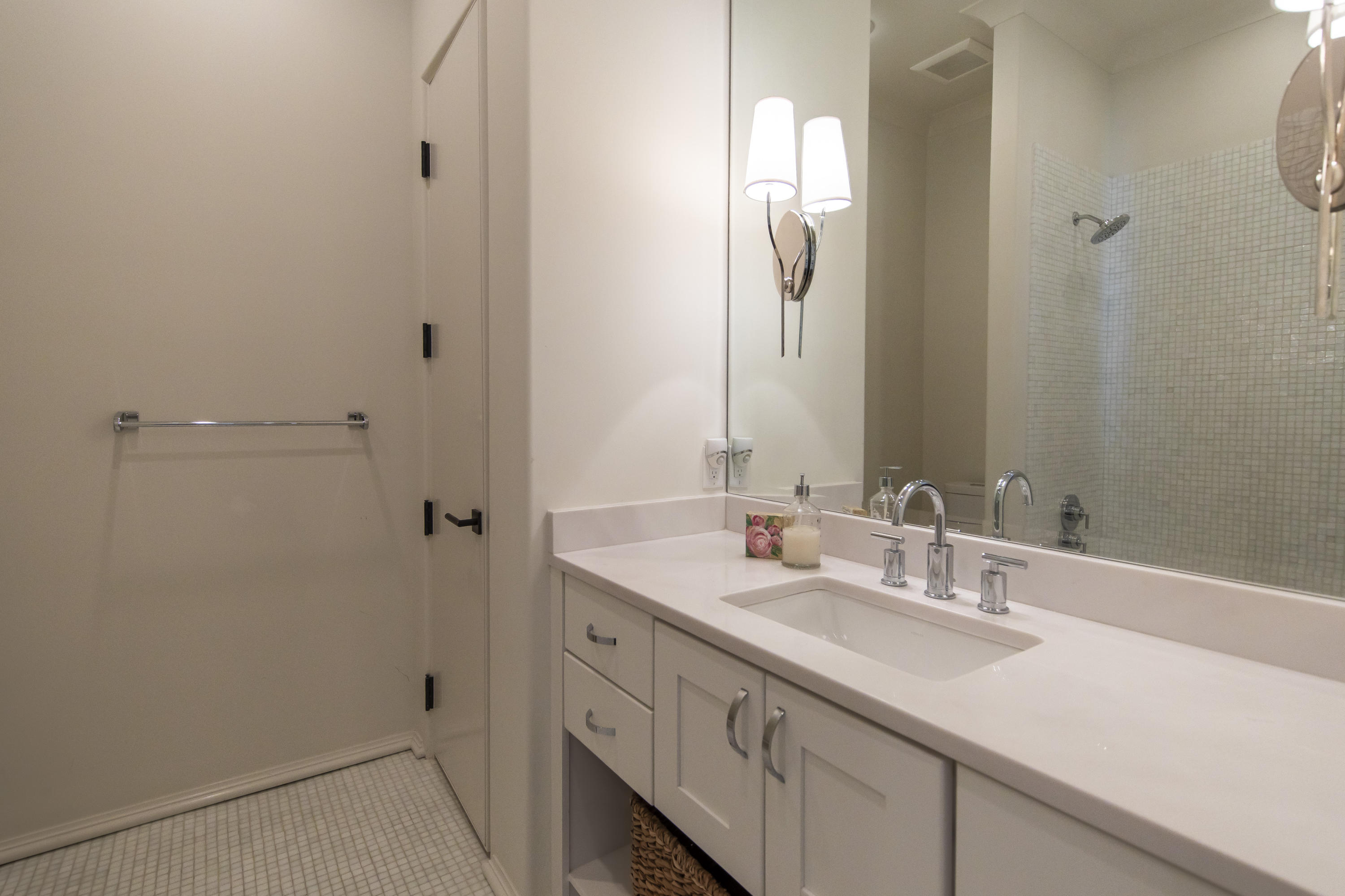 1095 Driftwood Point Road Santa Rosa Beach, FL 32459 - Photo 26 of 44 a bathroom with a sink and a mirror