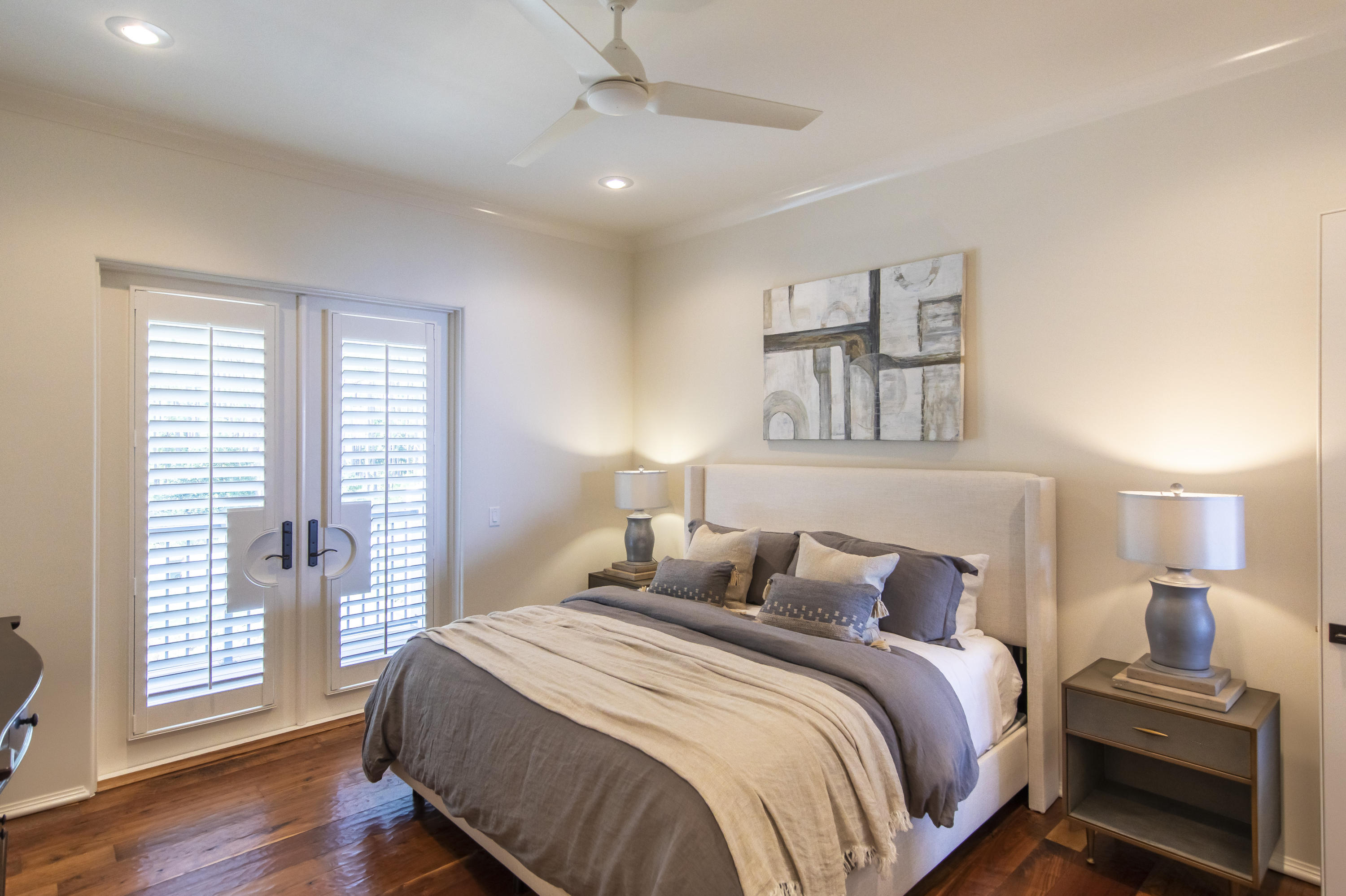 1095 Driftwood Point Road Santa Rosa Beach, FL 32459 - Photo 31 of 44 a bedroom with a bed and wooden floor