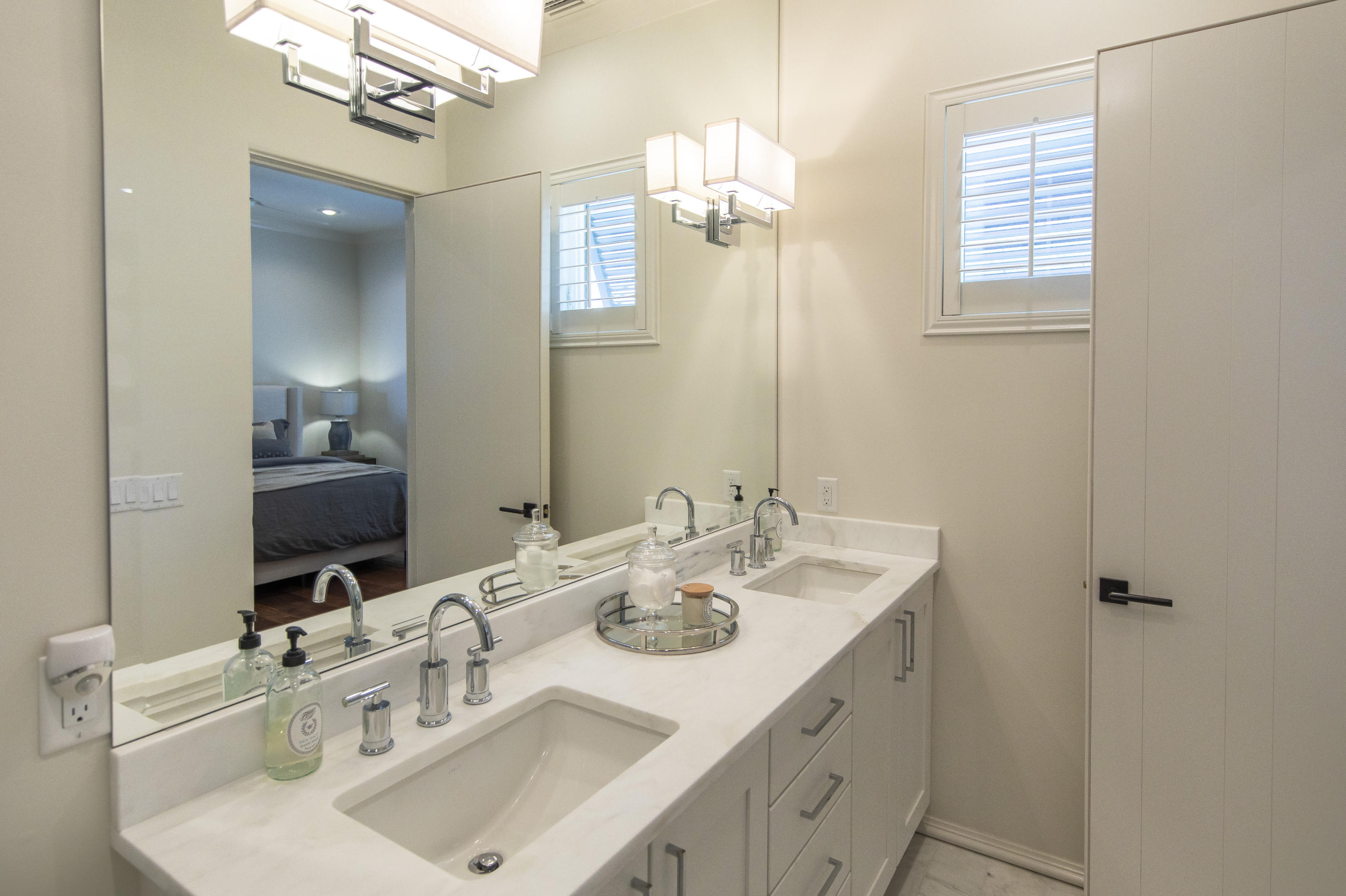 1095 Driftwood Point Road Santa Rosa Beach, FL 32459 - Photo 33 of 44 a bathroom with a sink double vanity and a mirror