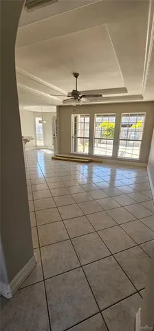 a view of empty room with windows