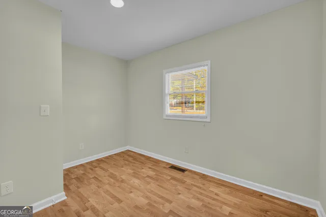 a view of livingroom with wooden floor