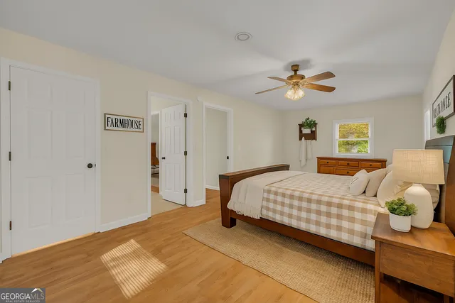 a bathroom with a sink a mirror and a shower