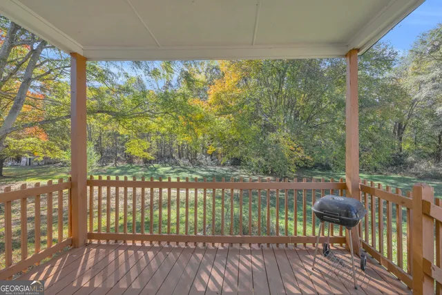 a balcony with wooden floor