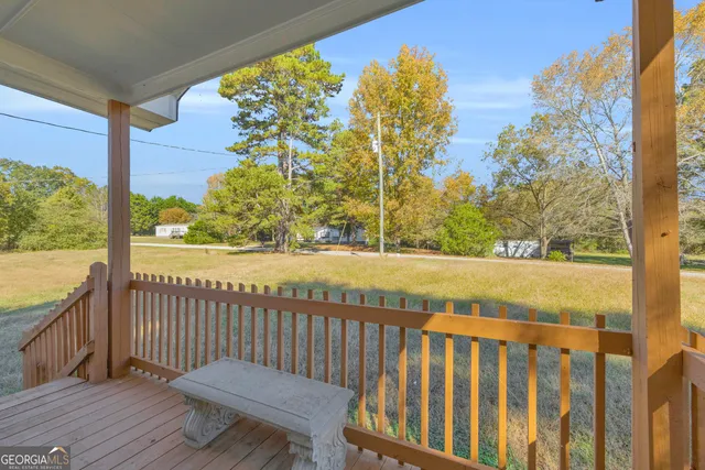 a view of balcony with furniture