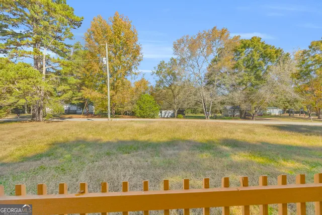 a view of swimming pool with an ocean view