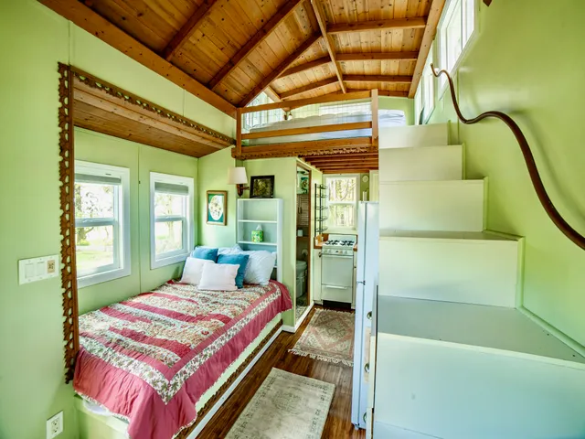 a kitchen that has a sink and a stove in it