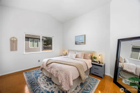 a bed room with a bed and a couch