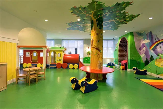 a room with lots of residential furniture and toys