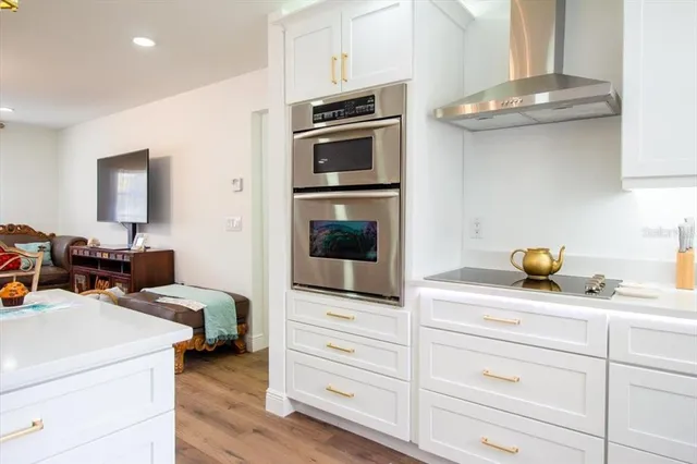 a kitchen with a sink and a window