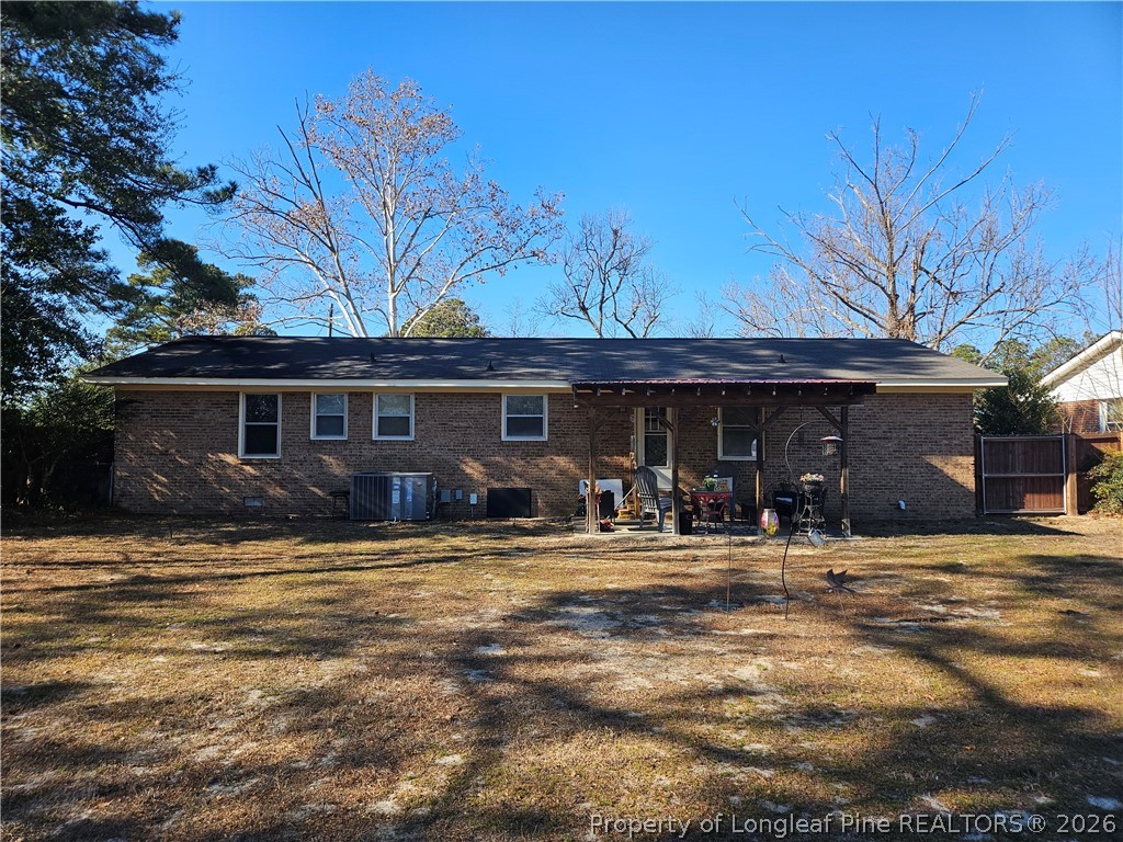 4547 Legion Road Hope Mills, NC 28348 - Photo 2 of 28 a front view of a house having patio