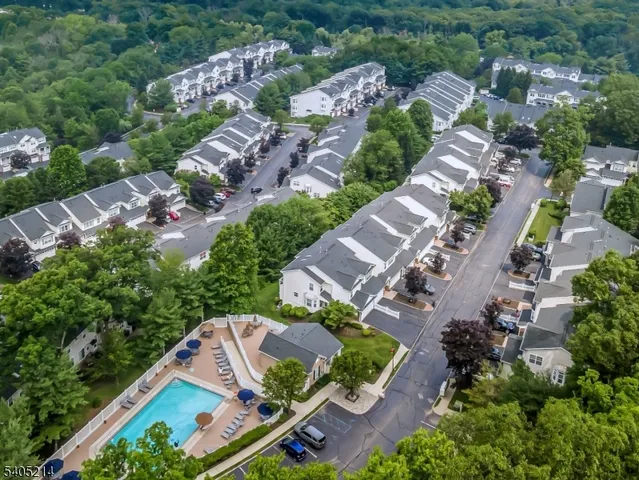 an aerial view of residential house with outdoor space