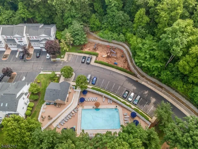 an aerial view of a house with a garden
