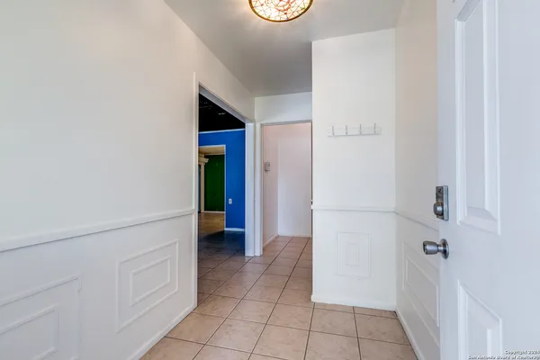 a view of an entryway with hallway