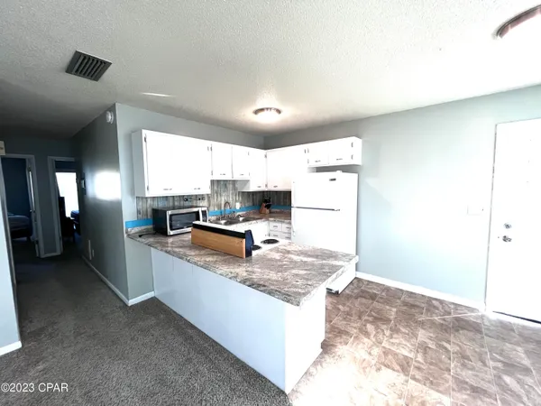 $1,500 | 231 Poinsettia Drive, Unit A, Panama City Beach, FL 32413