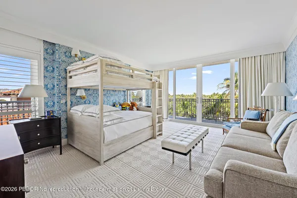 a bed room with a bed and a couch