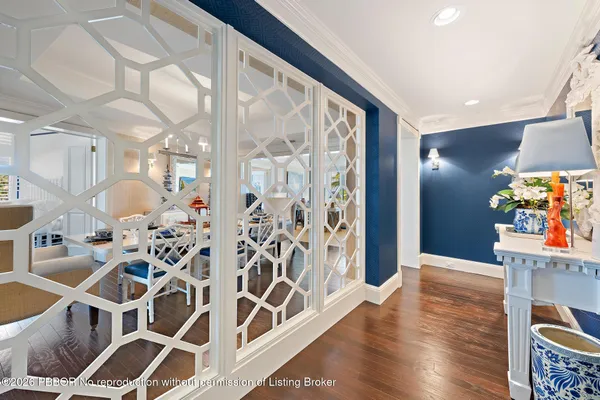 a very nice looking dining room with wooden floor