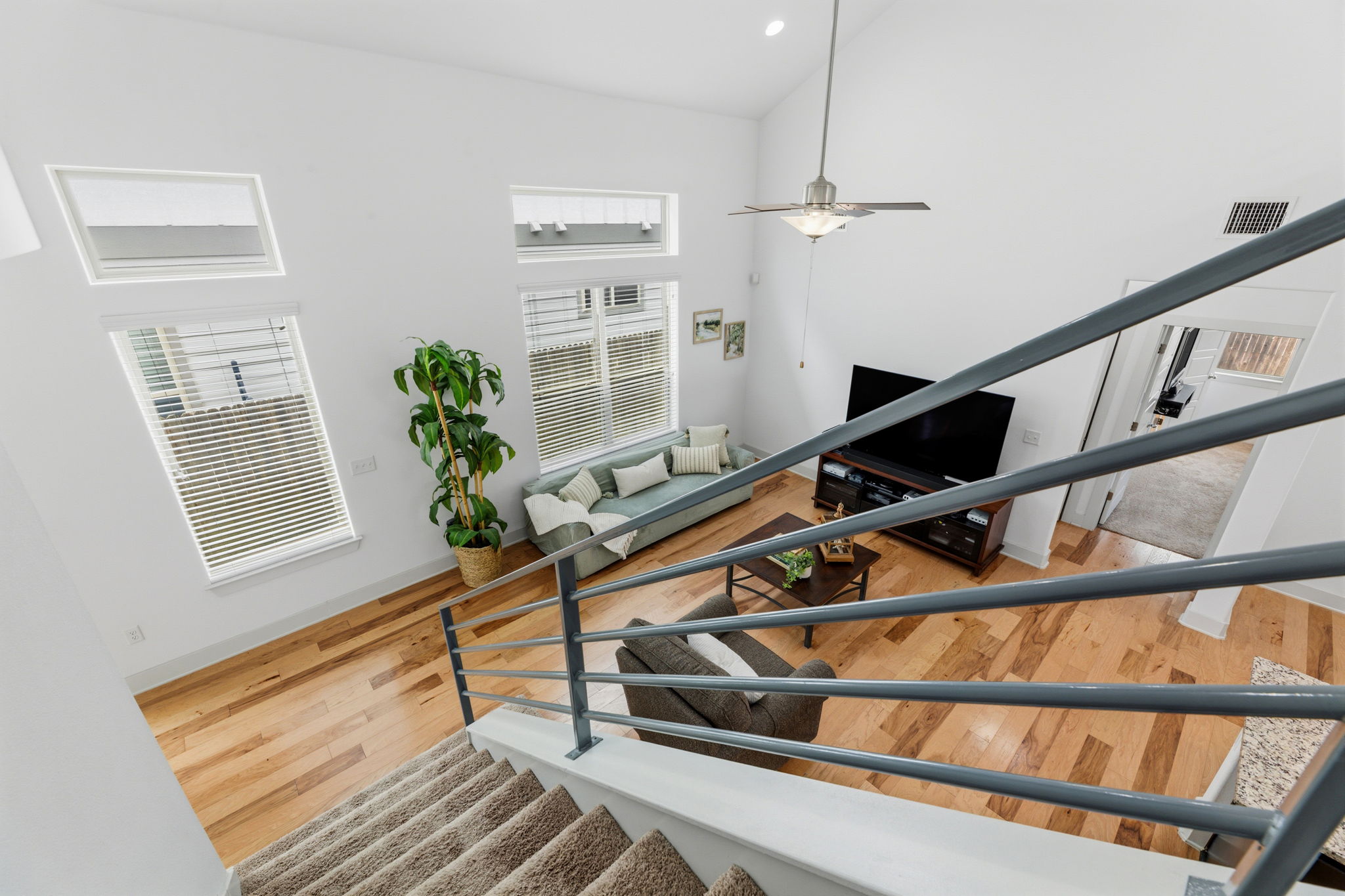 1007 Totis Road Austin, TX 78748 - Photo 27 of 37 a view of staircase with a potted plant on a table