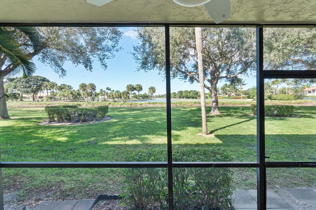 2900 Southwest 22nd Circle, Unit 221E Delray Beach, FL 33445 - Photo 24 of 43 a view of a garden from a window