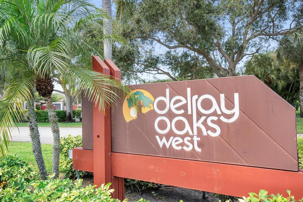 2900 Southwest 22nd Circle, Unit 221E Delray Beach, FL 33445 - Photo 31 of 43 a view of street sign