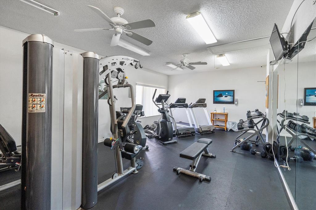2900 Southwest 22nd Circle, Unit 221E Delray Beach, FL 33445 - Photo 33 of 43 a view of a room with gym equipment