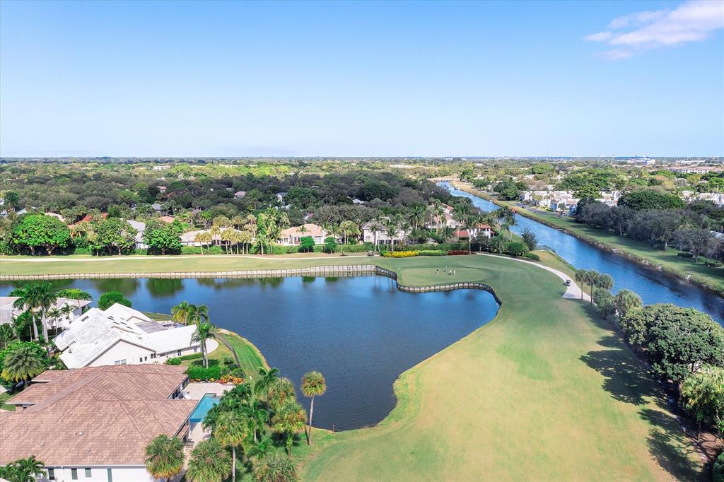 2900 Southwest 22nd Circle, Unit 221E Delray Beach, FL 33445 - Photo 35 of 43 an aerial view of a house with a lake view