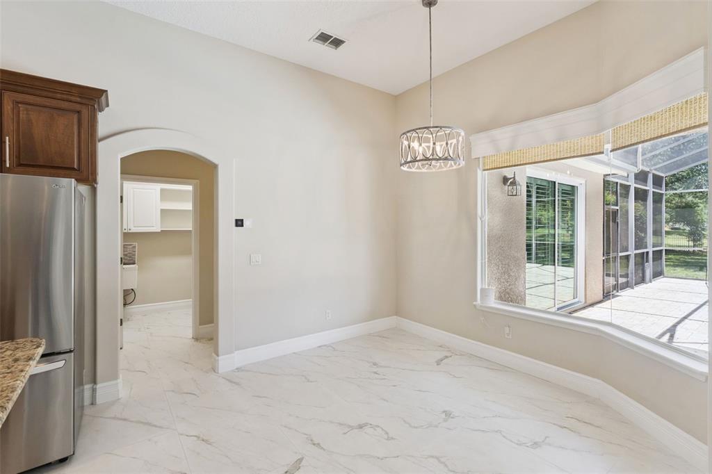 2230 Ridgewind Way Windermere, FL 34786 - Photo 16 of 38 a view of an empty room with a window