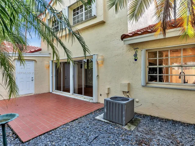 a house view with a outdoor space