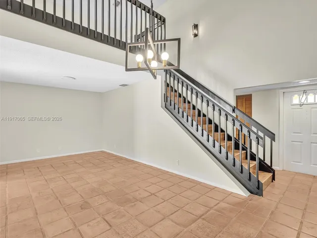 a view of a kitchen with a sink cabinets and a window