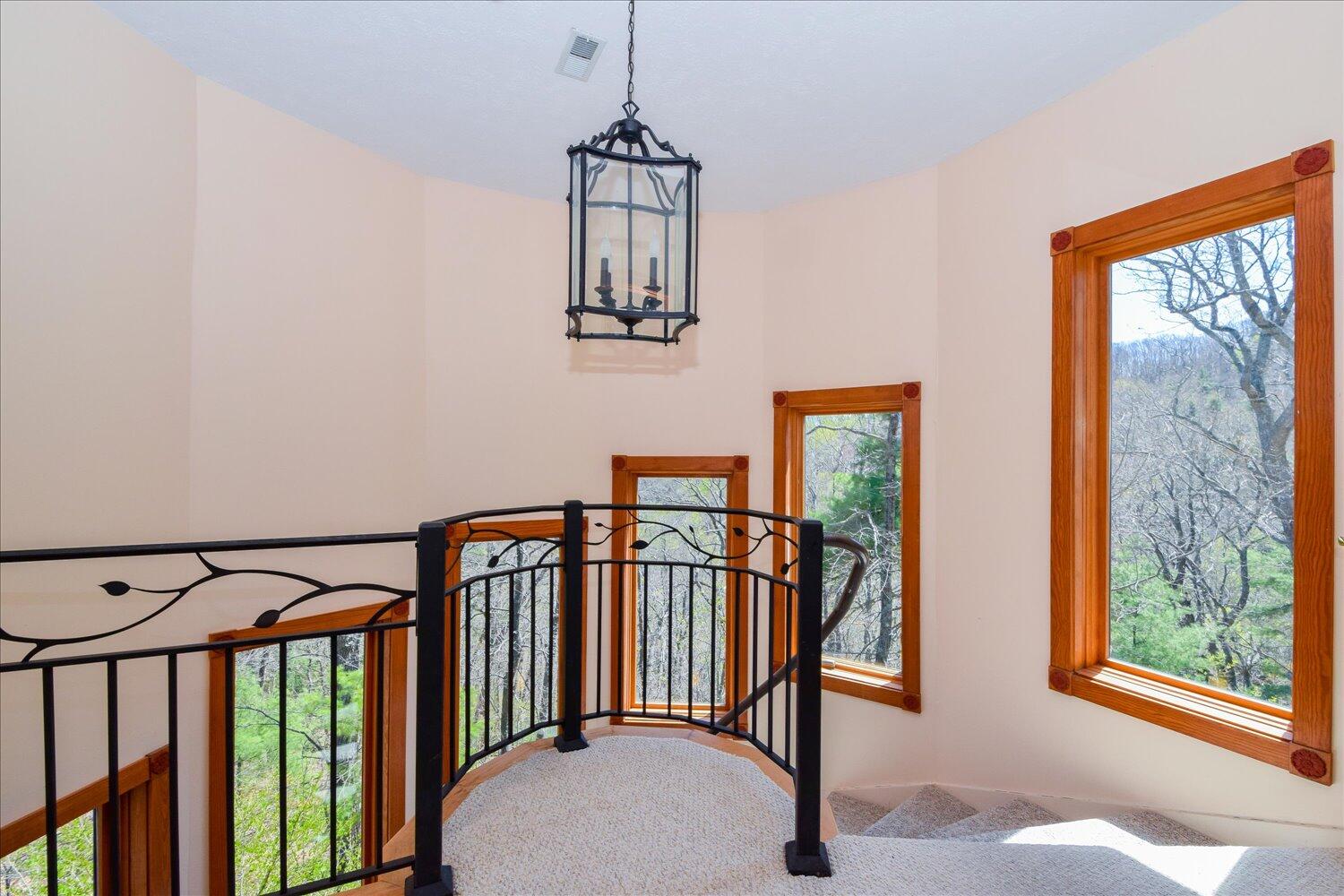 380 Hemlock Ridge Road Southeast Copper Hill, VA 24079 - Photo 13 of 59 a view of a hallway with wooden floor and windows