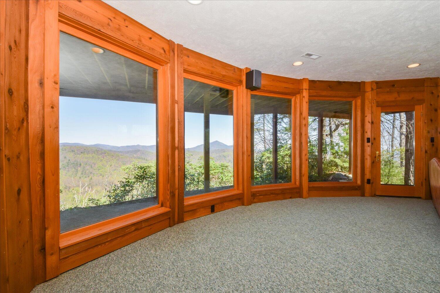 380 Hemlock Ridge Road Southeast Copper Hill, VA 24079 - Photo 27 of 59 a view of room with window and floor to ceiling window