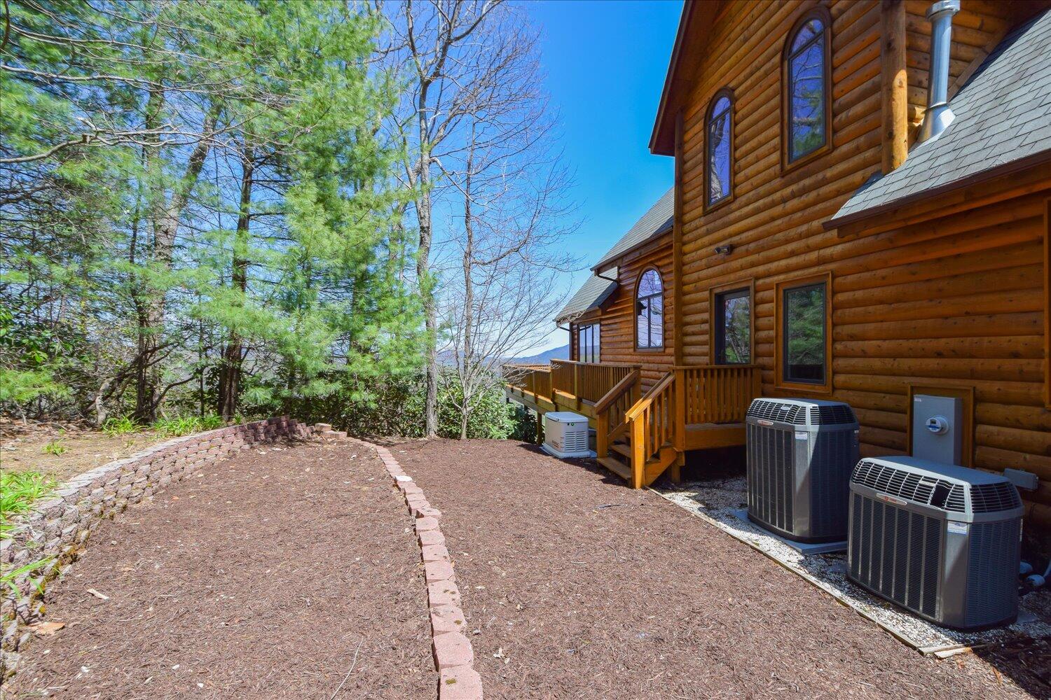 380 Hemlock Ridge Road Southeast Copper Hill, VA 24079 - Photo 31 of 59 a view of a backyard with entertaining space