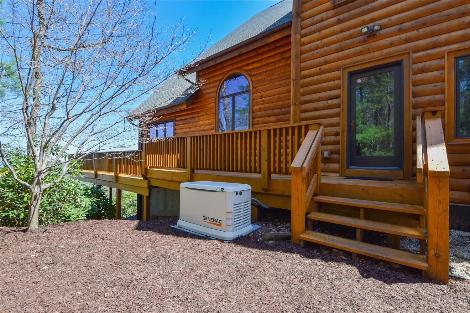 380 Hemlock Ridge Road Southeast Copper Hill, VA 24079 - Photo 32 of 59 a view of backyard with deck and outdoor seating