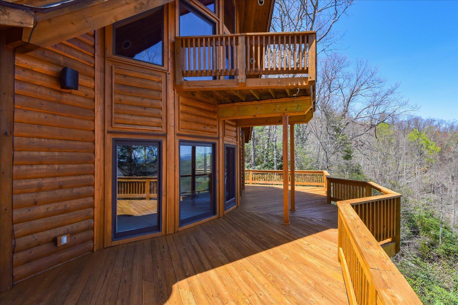 380 Hemlock Ridge Road Southeast Copper Hill, VA 24079 - Photo 36 of 59 a view of a balcony with wooden floor and fence