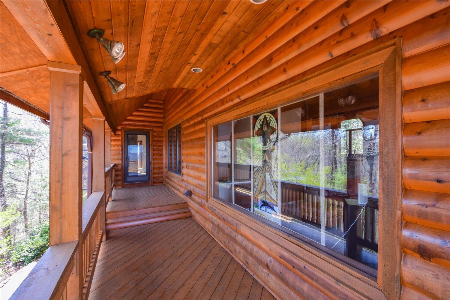 380 Hemlock Ridge Road Southeast Copper Hill, VA 24079 - Photo 37 of 59 a view of a room with wooden floor and windows