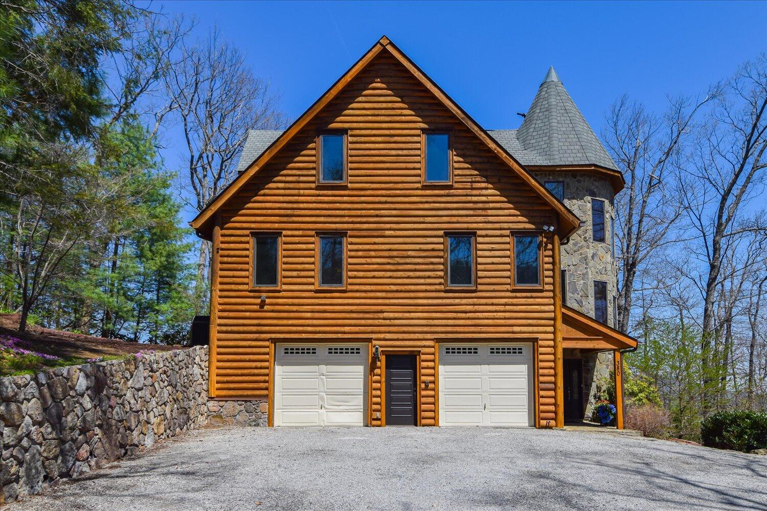 380 Hemlock Ridge Road Southeast Copper Hill, VA 24079 - Photo 4 of 59 a view of a house with a yard and garage