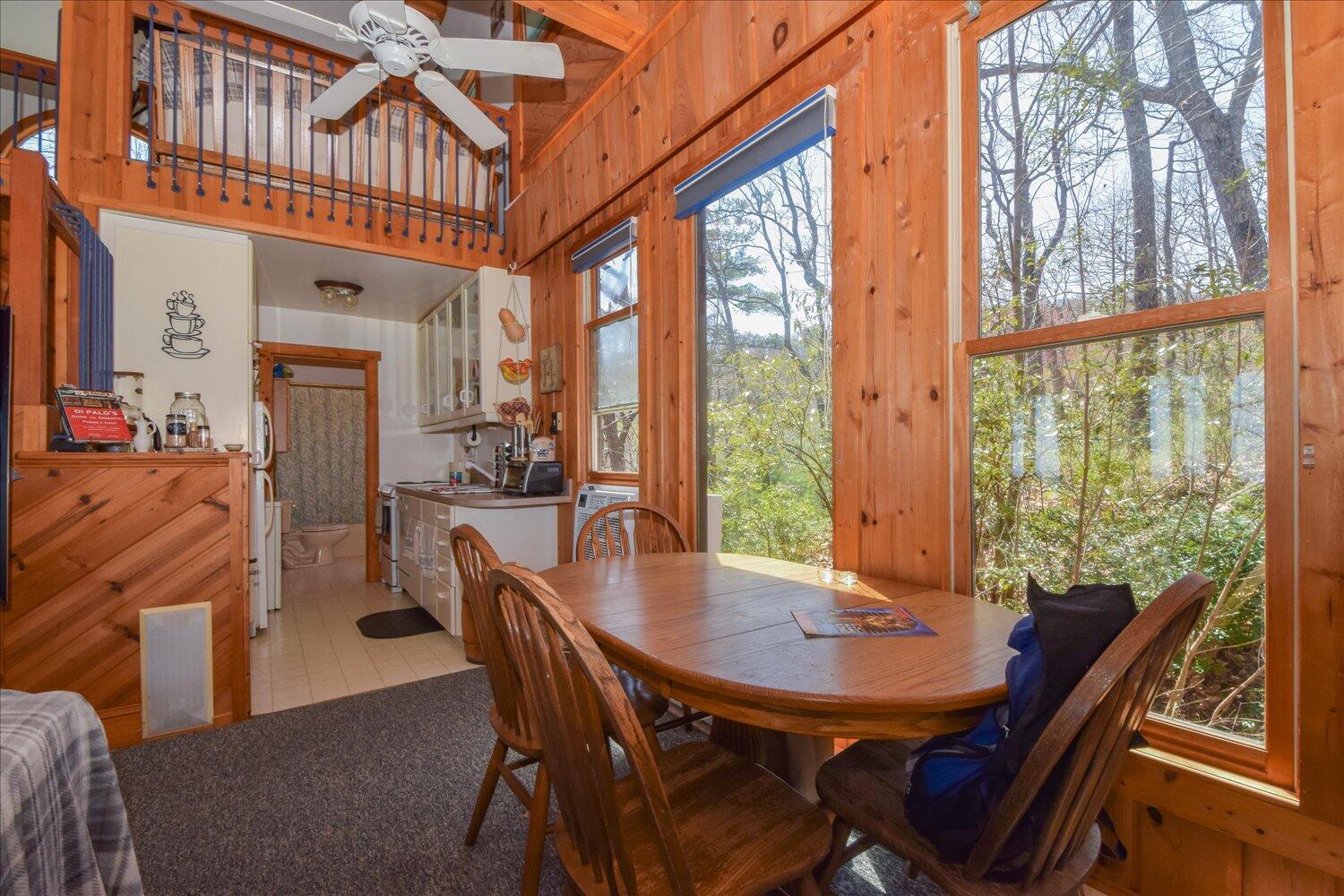 380 Hemlock Ridge Road Southeast Copper Hill, VA 24079 - Photo 52 of 59 a view of a dining room with furniture window and wooden floor