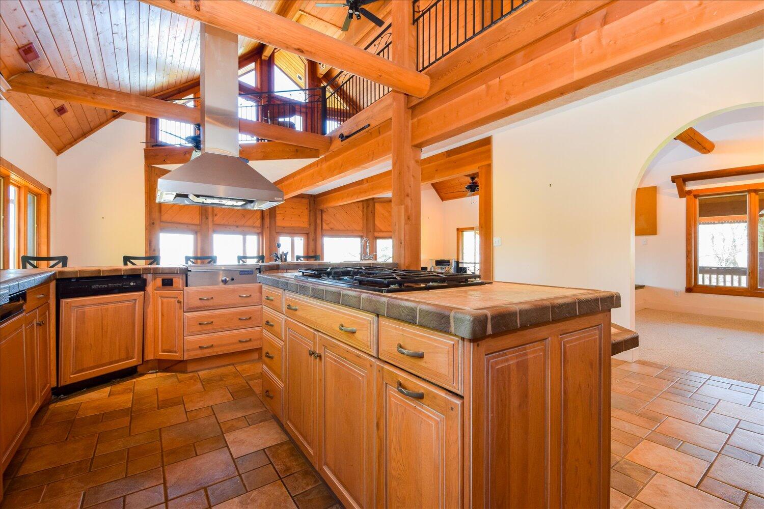 380 Hemlock Ridge Road Southeast Copper Hill, VA 24079 - Photo 6 of 59 a kitchen with stainless steel appliances granite countertop a stove a sink and dishwasher