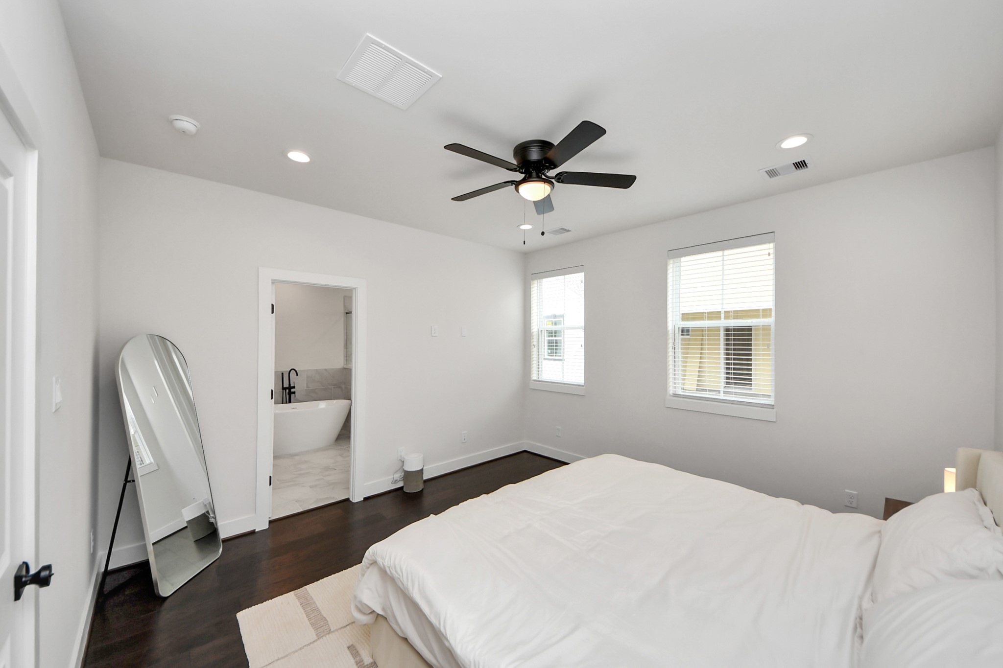 5502 Wheatley Street, Unit B Houston, TX 77091 - Photo 22 of 35 a bedroom with a bed and a window