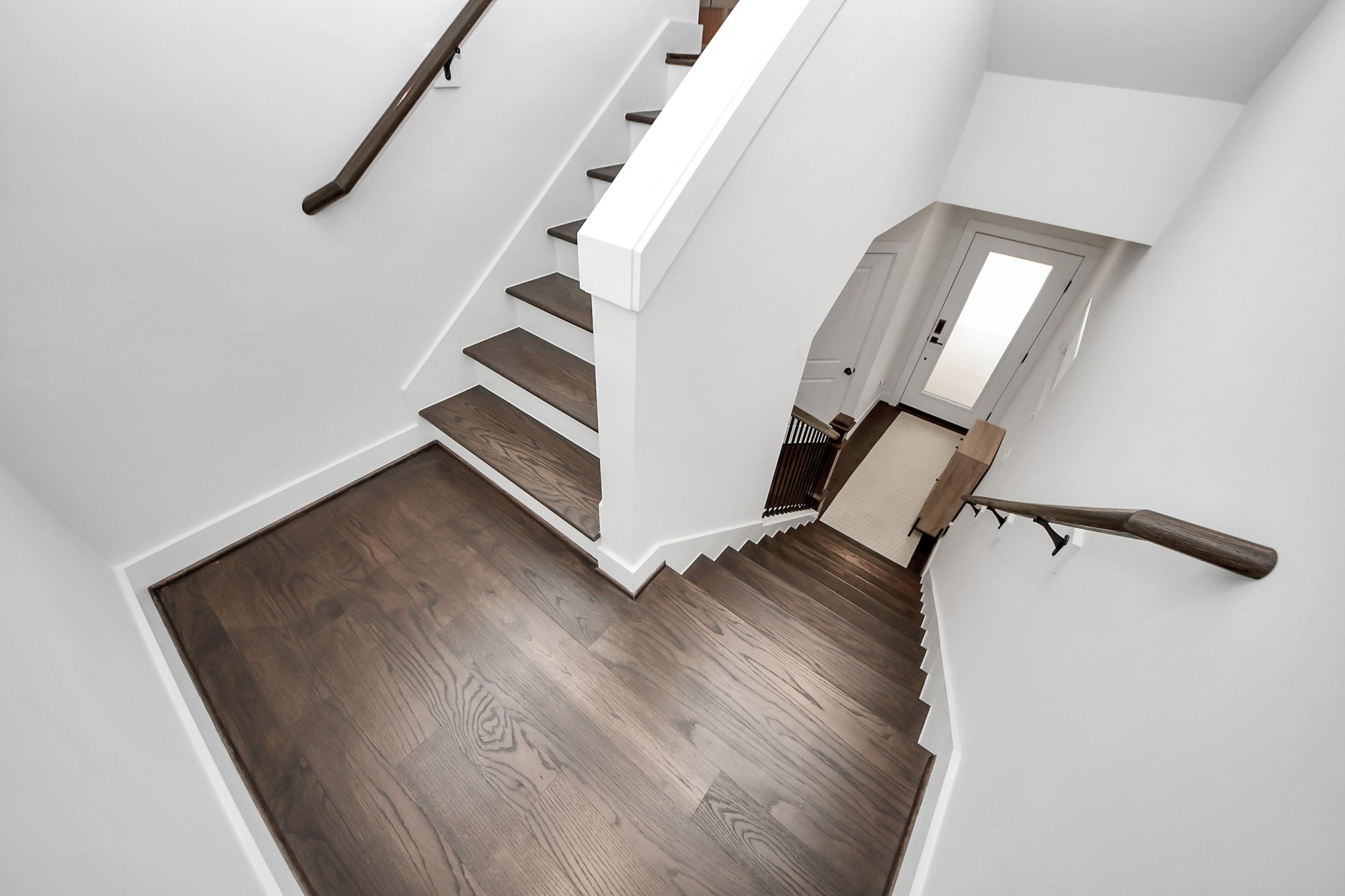 5502 Wheatley Street, Unit B Houston, TX 77091 - Photo 6 of 35 an entryway in a room with wooden floor