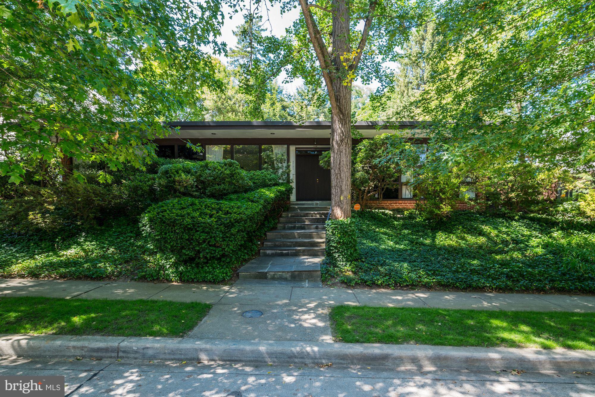3721 Huntington Street Northwest Washington, DC 20015 - Photo 1 of 30 Front facade with mature landscaping