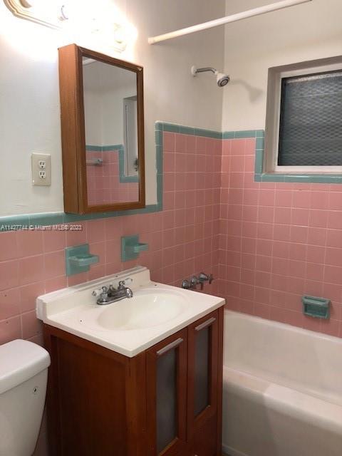 701 Southwest 20th Road, Unit A Miami, FL 33129 - Photo 4 of 4 a bathroom with a sink and a mirror