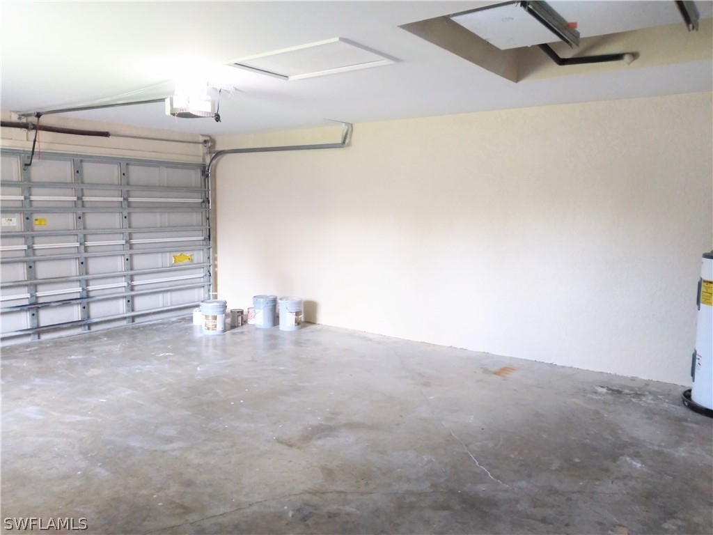2213 Wilson Road Lehigh Acres, FL 33973 - Photo 14 of 14 a view of empty room with ceiling fan and window