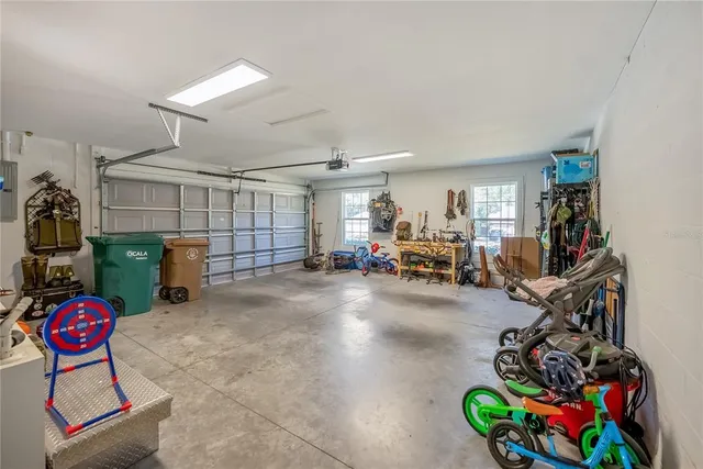 a view of a garage with a bike and car