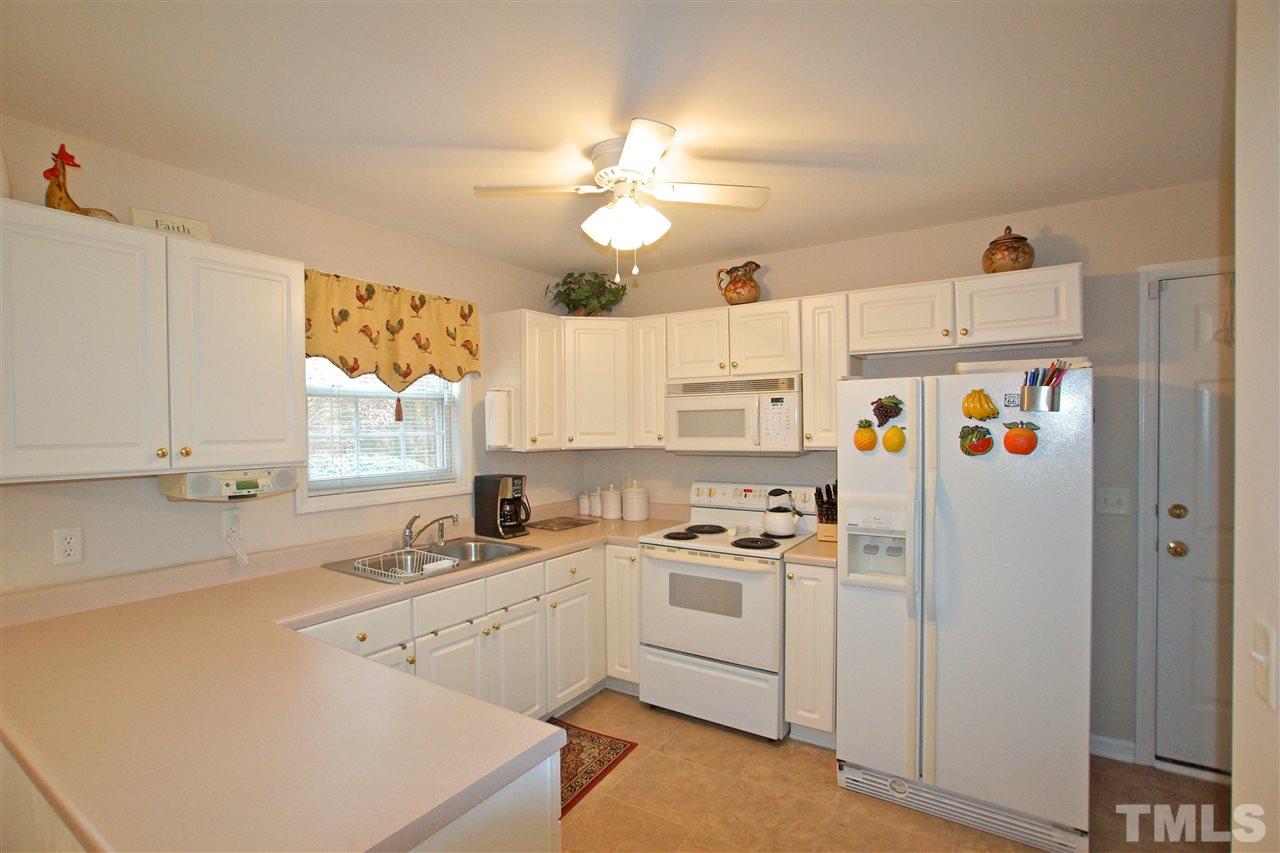 724 Windcrest Road Durham, NC 27713 - Photo 2 of 24 Great kitchen with perfect counter space and plenty of room to enjoy with friends.