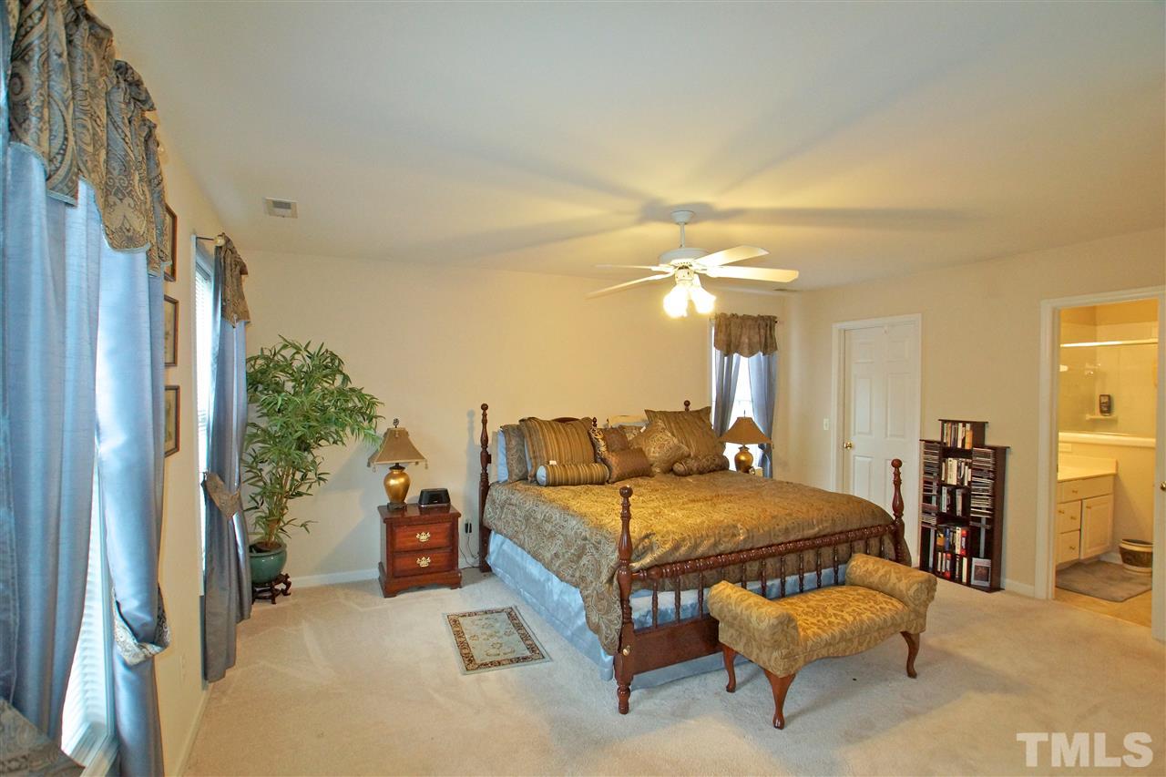 724 Windcrest Road Durham, NC 27713 - Photo 14 of 24 Oversized master bedroom with large closet and luxury bath.